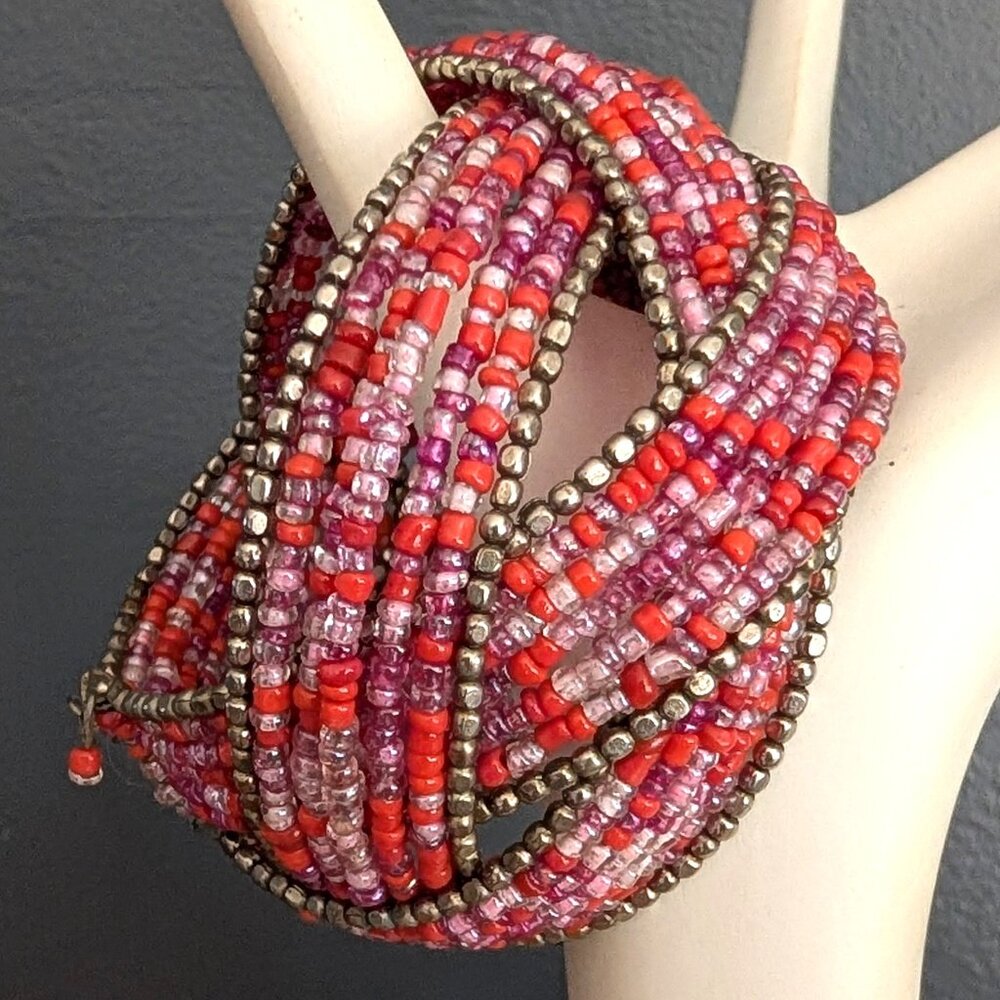 Orange, purple and pink seed bead cuff bracelet with antique gold accents